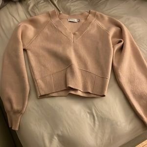 Rarely worn light pink sweater. Crop fit